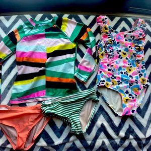 Kids swim lot. Tea and Cat & Jack size 6-7